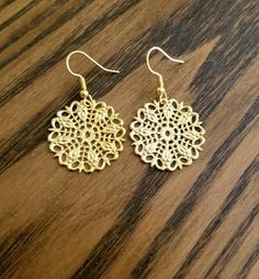 Check out this item in my Etsy shop https://www.etsy.com/listing/1233208388/gold-filigree-earrings-disc-drop Hypoallergenic Metal Chandelier Earrings As Gift, Hypoallergenic Metal Chandelier Earrings For Gift, Hypoallergenic Brass Dangle Earrings, Adjustable Gold Round Flower Earrings, Metal Dangle Earrings For Crafting, Metal Chandelier Earrings As Gift, Round Metal Chandelier Earrings For Gift, Round Metal Chandelier Earrings As Gift, Adjustable Chandelier Earrings For Gifts