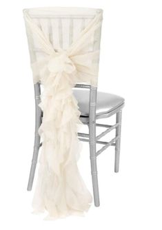 a chair with a white ruffled sash on it's back and the seat