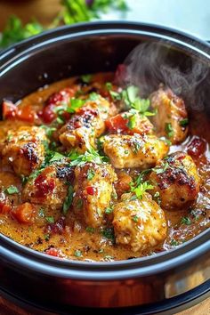 a close up of a bowl of food with some steam coming out of the top