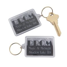 two key tags with the words prom, magic at midnight and shadow lake on them