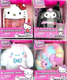 three hello kitty stuffed animals in their packagings, one is white and the other is pink