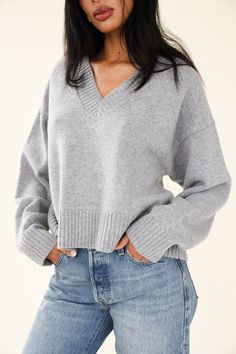 The Elora is a classic V neck sweater. Boxy fit with a small outer seam detail on the sleeve. She's made from 100% RWS certified Merino Wool. Model wears size S, she is 5'10. Grey V Neck Sweater Outfit, Sweater Outfits