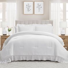 a white comforter with ruffled edges in a bedroom