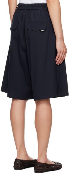 Stretch recycled polyester- and wool-blend delaine shorts. · Belt loops at partially elasticized waistband · Four-pocket styling · Zip-fly · Pleats at front · Logo flag at back pocket Supplier color: Night Knee-length Workwear Shorts With Elastic Waistband, Knee-length Shorts With Elastic Waistband For Work, High-waisted Bermuda Shorts With Elastic Waistband For Work, Bermuda Work Shorts With Elastic Waistband, Back Pocket, Wool Blend, Flag, Wool, Navy