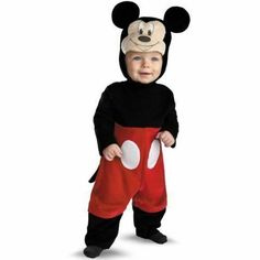 a baby dressed in mickey mouse costume