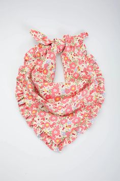 Create effortless looks with our Bandana and Headscarf. This retro-style bandana promises to give you a relaxed yet chic look. Crafted with a cotton blend fabric, it features a classic print with a trendy and cute ruffle trim. You can wear it as a bandana, as a neck scarf, as a headscarf, or fold it and wear it as a headband with a bow-knot on the front. 30" wide x 15" long Cotton / Polyester Toile Fabric Packaged in a custom hanging sleeve for easy display Style Bandana, Toile Fabric, Cotton Blend Fabric, Bow Knot, Some Text, Neck Scarf, Neck Scarves, Head Scarf, Ruffle Trim