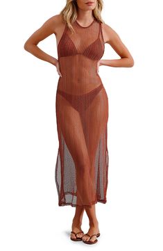 This stunning cover-up dress is completely sheer to show off what's underneath as you lounge by the water feeling your most confident. 43" length ( size Medium) Slips on over head Jewel neck Sleeveless Sheer 58% polyamide, 32% polyester, 10% elastane Hand wash, dry flat Made in Brazil Hispanic & Latinx Owned/Founded Sheer Beach Cover-up For Vacation, Sheer Beach Cover-up For Beach Season, Sheer Cover-up For Beach Season, Sheer Beach Swimwear, Sheer Beachy Swimwear For Beach, Sheer Beachwear Cover-up For Beach, Sheer Beachwear Cover-up, Sheer Cover-up For Beach Party Vacation, Sheer Beach Cover-up