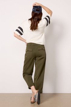 Utility-style pockets detail the Cruiser Chino pants by Sanctuary, featuring a slight barrel leg shape with rolled hems. Dress them up with a blouse and mules, or keep them casual with a tee and slides. | SANCTUARY Women's Cruiser Chino Pants, Size 24, Green Fall Cargo Pants With Relaxed Fit, Spring Cargo Pants With Pockets For Workwear, Relaxed Fit Fall Cargo Pants, Relaxed Fit Fall Cargo Trousers, Fall Relaxed Fit Cargo Pants, Fall Relaxed Fit Straight Cargo Pants, Relaxed Fit Straight Cargo Pants For Fall, Spring Utility Bottoms For Elevated Casual, Olive High-waisted Pants For Spring