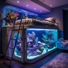 a bed room with a ladder to the top of it and an aquarium in front of it