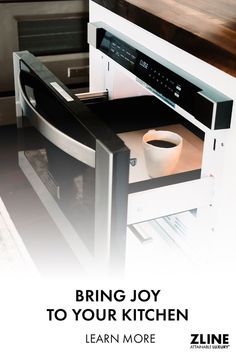 a coffee cup is sitting in an oven with the words bring joy to your kitchen learn more