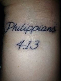 a tattoo with the words philipians 4 13 written in cursive font