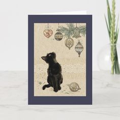 a card with a black cat sitting on its hind legs