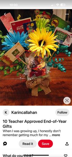 a vase filled with lots of flowers on top of a wooden table in front of an instagram page