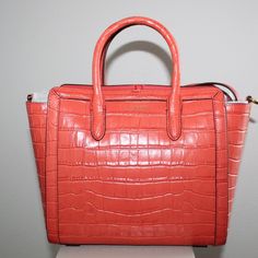 Beautifully Crafted From Crocodile-Embossed Leather, The Tyler Tote From Lauren Ralph Lauren Is Designed With A Structured Silhouette, Which Allows For Ample Room To Store Your Essentials. Medium Sized Bag; 13-1/2"W X 9"H X 4-1/2"D (Width Is Measured Across The Bottom Of Handbag); 8-1/2"L Top Handles; 22"L Removable Crossbody Strap Dog-Clip Closure Foil-Printed Exterior Logo Interior Slip Pocket Tablet Compatible (Std. Size 8"-10") Dust Bag Included Shell: Leather; Bonding: Polyurethane Spot Cle Luxury Ralph Lauren Office Bag, Ralph Lauren Leather Shoulder Bag With Detachable Strap, Ralph Lauren Leather Satchel Bag, Ralph Lauren Leather Satchel, Ralph Lauren Leather Crossbody Shoulder Bag, Ralph Lauren Top Handle Formal Bag, Ralph Lauren Formal Top Handle Bag, Ralph Lauren Rectangular Satchel For Daily Use, Rectangular Ralph Lauren Satchel For Daily Use