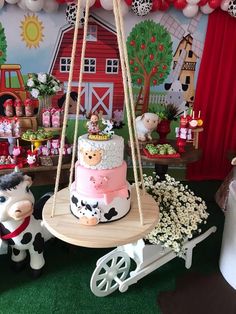 a birthday party with farm animals and decorations