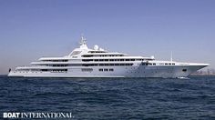 a large white boat floating on top of the ocean