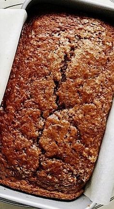 a loaf of bread sitting in a pan on top of a table