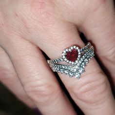 Absolutely Stunning Rings!! Red Heart Ring And Tiara Crown From Pandora.. Perfect To Stack. It's 2 Separate Rings.. Sterling Silver. Both Are Too Big On Me. Selling Them Together, Both Size 8 1/2 . Price Not Negotiable, Ring Box, Bag Included. All Brand New. This Is A Good Deal! I Am A Full-Time Caregiver To A Parent Who Has Dementia. All Money From Sales Will Be Used For Medical Supplies And To Continue To Care For My Loved One At Home. Thank You Black And Red Promise Ring, Pandora Red Heart Ring, Red Stackable Promise Jewelry, Red Stackable Jewelry For Promise, Pandora Rings Stacked Ideas, Wedding Rings Ruby, Pandora Rings Stacked, Red Heart Ring, Stunning Rings