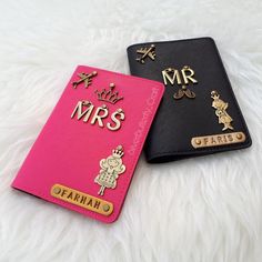 two small personalized notebooks on a white furnishing with the word mr and mrs written in gold