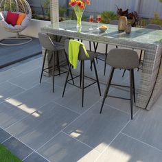 an outdoor dining table with four chairs