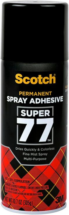 a can of spray adhesivee that is black and red with the number seven on it