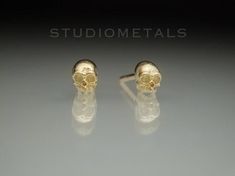 Tiny, gold skull stud earrings, handmade in 14K yellow, white or rose gold. These little half skull earrings are delicate, cute and just the right amount of sinister!-Each skull is 3.5mm wide, 4.5mm high and is solid gold.-14K gold posts and butterfly backs.-Available in 14K yellow, white or rose gold.These tiny skull earrings arrive nicely wrapped, perfect for a gift to self or to someone special!Please allow us 1-2 weeks to make your skull studs prior to shipping. Shipped FedEx Ground or Canad Gold Skull Earrings Nickel Free, Gold Skull-shaped Earrings, Anatomy Jewelry, Half Skull, Tiny Gold Studs, Skull Wedding Ring, Skull Wedding, 3d Skull, Small Skull