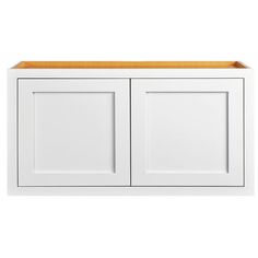 a white cabinet with two doors and a wooden shelf on the top, against a white background