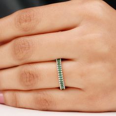 Product Details Elegantly designed for everyday styling, this Eternity Ring is adorned with Baguette Cut Lab Created Emerald. Complement your outfit with this Stackable Ring for an elegant look. Product Information SKU SHP-RINGS052183614 Width 1.4 mm Height 2.5 mm Weight 2.16 gm (Approximate) LAB CREATED EMERALD INFORMATION No.of Stones 45 Pieces Total Weight 2.70 Carat (Approximate) Dimension(approx) Baguette-1.50X3.00 mm-45 Pcs Color Green Cut Brilliant Shape Baguette Setting Type Shared-Prong-Setting Quality Grade AAAA View More Product Parent Collection Handle lab-created-emerald-rings Emerald Eternity Ring, Lab Created Emerald, Ring Sizer, Stackable Ring, Baguette Cut, Emerald Ring, Stackable Rings, Yellow Gold Rings, Eternity Ring