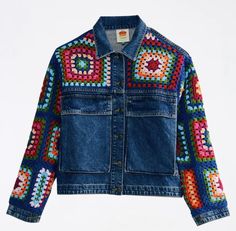 a denim jacket with multicolored squares on it