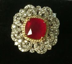 18K 2-TONE GOLD 6.34 CT. GIA CERTIFIED NATURAL VIVID RED RUBY & VS DIAMOND COUTURE RING!! RARE GENUINE INVESTMENT QUALITY RUBY!! STAYS PERFECTLY RED IN ALL LIGHTING CONDITIONS. ESTIMATED RETAIL $ 34,000 **SEE VIDEO** https://www.youtube.com/watch?v=KC_m2RFmI-4 ITEM DESCRIPTION: THIS IS AN INVESTMENT QUALITY GIA CERTIFIED VIVID RED RUBY RING, FEATURING AN INCREDIBLY RARE NATURAL EARTH-MINED 3.55 CARAT VIVID RED RUBY, AND 2.79 CARATS OF VS TO SI DIAMONDS, IN A LOVELY COUTURE DESIGNER  SETTING. THIS RARE HIGH END RUBY, HAS THE HIGHLY SOUGHT AFTER VIVID PURE RED COLOR THAT PRESENTS A BEAUTIFUL "BURNING EMBERS" GLOW AND SPARKLE. YOU CAN EVEN SEE "RED FLASHES" IN THIS RUBY!! THIS GEMSTONE DISPLAYS  HIGH BRILLIANCE!! THIS IS UNUSUAL FOR A RUBY, AS THEY ARE USUALLY VERY FLAT, DULL, GLASS-FILLED, O Burning Embers, Red Ruby Ring, Vs Diamond, Red Ruby, Ruby Ring, Natural Ruby, Round Brilliant Cut Diamond, White Gold Rings, Rings Statement