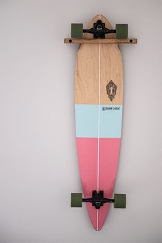 a surfboard mounted to the side of a wall