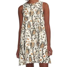 Loose-fit, mid-length sleeveless dress with silky handfeel. Printed on both sides. Machine washable. Size range XS-2XL. Celebrate the cozy charm of autumn with our "Autumn Owls" artwork! This elegant design features a series of cute, stylized owls perched on slender branches amidst a scattering of fall leaves. Rendered in a warm, earthy palette of browns, oranges, and beiges, this pattern captures the essence of a serene autumnal forest. Each owl brings its own personality, making this design perfect for anyone who adores wildlife and seasonal decor. Product Features: High-quality print that captures the subtle textures and rich, muted colors of the design. Ideal for a variety of products including apparel, home decor, and accessories. Perfect for owl enthusiasts and fans of autumn-themed Autumnal Forest, Earthy Palette, Owl Artwork, Owl Collection, Subtle Textures, Fall Leaves, Dress For Sale, Muted Colors, Mid Length