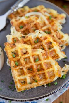 three waffles with cheese and chives on top