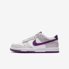 Designed for basketball but adopted by skaters, the Nike Dunk Low helped define sneaker culture. Now this mid-'80s icon is an easy score for your closet. With ankle padding and durable rubber traction, these are a slam dunk whether you're learning to skate or getting ready for school. Nike Dunks Low Purple, Womens Nike Dunks, Nike Dunks Women, Nike Dunks Outfit Woman, Nike Sb Women, Zapatos Aesthetic, Fancy Sneakers, Nike Dunks Low, Getting Ready For School