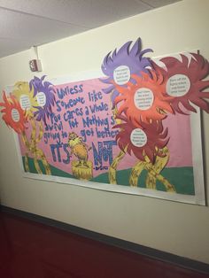 a bulletin board with dr seuss and the grinnies on it's side