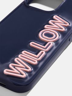 a phone case with the word wow on it in pink and navy blue, against a white background