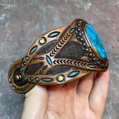 Western Style Blue Cuff Bracelet Gift, Blue Leather Jewelry For Festivals, Bohemian Festival Bracelet With Patina, Bohemian Turquoise Inlay Cuff Bracelet, Handmade Southwestern Turquoise Cuff Bracelet, Handmade Western Turquoise Bracelets, Handmade Western Turquoise Bracelet, Handmade Southwestern Cuff Bracelet As Gift, Handmade Western Style Turquoise Bracelet