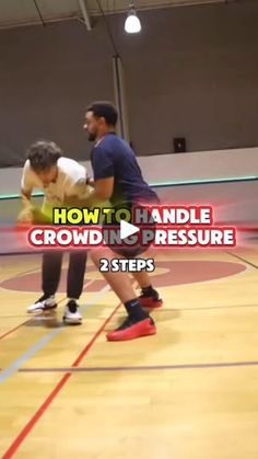 two men playing basketball in an indoor court with the words how to handle crowd in pressure