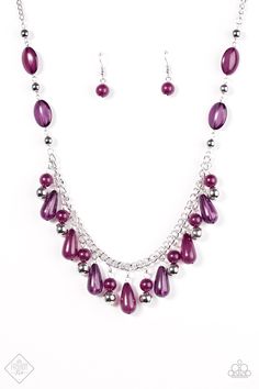 Featuring translucent and opaque shimmer, an array of purple beads trickles down a shimmery silver chain for a whimsical look. Shiny silver beads are sprinkled between the colorful accents, adding classic shimmer to the seasonal palette. Features an adjustable clasp closure. Sold as one individual necklace. Includes one pair of matching earrings. Purple Beaded Chain Jewelry For Party, Purple Necklaces With Dangling Round Beads, Purple Necklaces With Dangling Beads, Elegant Purple Beaded Necklace With Dangling Beads, Purple Dangling Beads Jewelry For Party, Purple Party Jewelry With Adjustable Chain, Adjustable Purple Necklaces With Dangling Beads, Adjustable Purple Beaded Necklace With Dangling Beads, Adjustable Purple Necklace With Dangling Beads