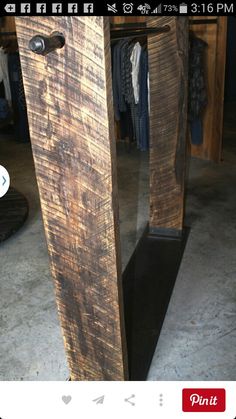 a large wooden object sitting on top of a floor