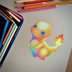 a drawing of a small yellow pokemon sitting on top of a table next to colored crayons