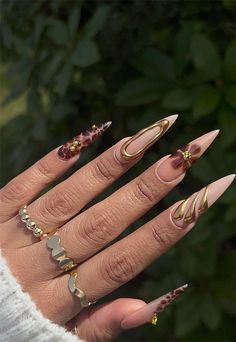 Golden Glam Stiletto Nails, fall nail designs, autumn nail designs Brown N Gold Nails, 2024 Stiletto Nails, Brown Freestyle Nails, Bali Inspired Nails, Pretty Stiletto Nails, Nail Inspo Stiletto, Stiletto Nails Summer, Bali Nails, Nails Reference