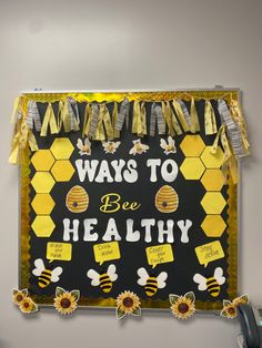 a bulletin board that says ways to be healthy with bees and honeycombs on it