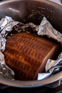 a piece of bread in foil wrapped in tinfoil