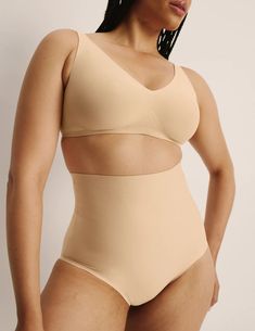 Feel the smoothing and shaping effect of comfortable targeted support zones. Designed to hug your tummy and lower back, while smoothing out your waistline. Fits like a glove, holds you in and stays put. Comfy enough for everyday so you can wear what you want, whenever you want. | Knix Shaper High Rise Briefs in Warm Sand Brown Wireless Bras, Wireless Bra, Hug You, Sports Bras, Lower Back, Mix Match, Briefs, High Rise, Lounge Wear