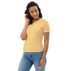 This Orange And White Striped Women's T-shirt is a trendy and stylish addition to any wardrobe. Made from a blend of 95% polyester and 5% elastane, it offers a comfortable and stretchy fit that hugs your curves in all the right places. The vibrant orange and white stripes add a pop of color to your outfit, making it perfect for both casual and dressier occasions. With its regular fit, this t-shirt is versatile and can be paired with jeans, shorts, or skirts for a chic and effortless look. Whether you're heading out for a day of shopping or meeting up with friends, this t-shirt is a must-have for any fashion-forward woman. See more striped clothing + FEATURES + 95% polyester, 5% elastane (fabric composition may vary by 1%) Premium knit mid-weight jersey Four-way stretch fabric that stretche Striped Clothing, Elastane Fabric, Outfit Making, Vibrant Orange, Orange White, Jeans Shorts, White Stripe, Stretch Fabric, Fashion Forward