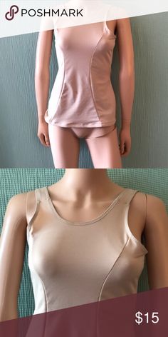 Cupid slimming tank. Size 2XL/2EG Slimming tank by Cupid, size 2XL/2EG, never worn, elastic on hem, tiny red spot on front Cupid Intimates & Sleepwear Shapewear Beige Stretch Top With Built-in Bra, Spring Tops With Medium Bust Support And Stretch, Fitted Beige Tank Top For Workout, Beige Fitted Tank Top For Workout, Sports Tops With Medium Bust Support For Summer, Summer Sports Tops With Medium Bust Support, Fitted Beige Workout Top, Spot On, Shapewear