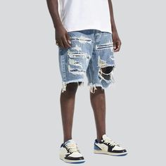 Make a statement with our 2023 Summer Collection Painted Baggy Damaged Denim Shorts. These shorts are patterned to reflect your free-spirited nature and unique sense of mode. Featuring a mid-rise design. they come with a zipper and button closure to ensure maximum comfort and convenience. Let their grunge-inspired ripped look and paint-splattered design take your summer wardrobe to the next level!Distinctive Features: Grunge-Inspired Torn Look: Step out of your comfort zone with these bold short Jean Shorts For Streetwear In Summer, Trendy Ripped Shorts For Streetwear, Urban Spring Shorts With Relaxed Fit, Urban Style Relaxed Fit Shorts For Spring, Casual Ripped Cutoff Shorts, Casual Distressed Shorts For Streetwear, Trendy Streetwear Jeans With Built-in Shorts, Urban Style Short Summer Bottoms, Urban Style Summer Shorts