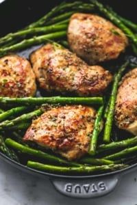 chicken and asparagus in a skillet with the words one pan dinner on it