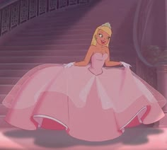 the princess in her pink dress is sitting on some stairs